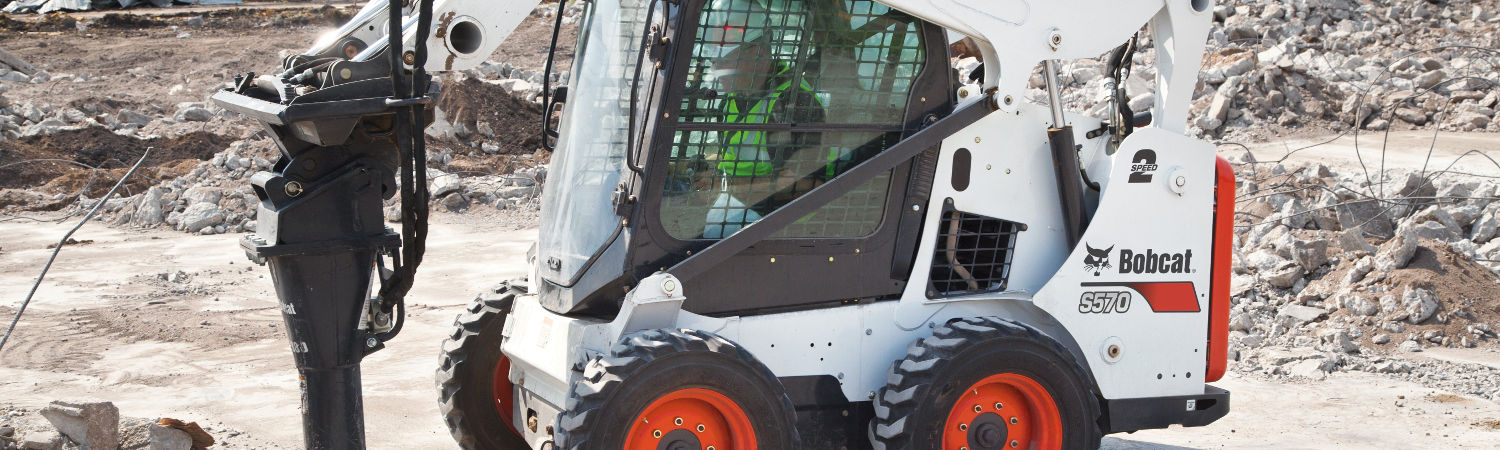 A 2018 Bobcat® S570 parked at a work site